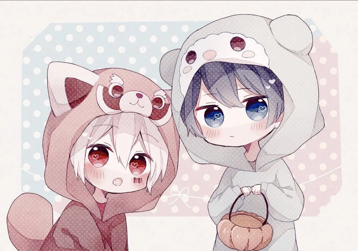 Hai nhân vật chibi mặc đồ thú dễ thương